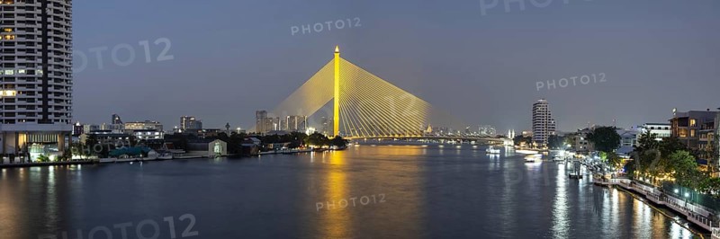 The illuminated Rama VIII Bridge over the Mae Nam Chao Praya, Bangkok, Thailand, Asia