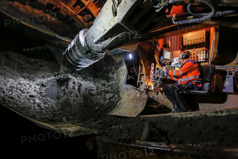 Theme photo Emscher conversion, the Emscher system will be wastewater-free in 2021 - new construction of a sewer on the Boye, the second largest tributary of the Emscher, a machine operator in the tunnelling machine digs the tunnel for the DN 3500 concrete wastewater pipes, the Boye is renaturalised and transformed into a near-natural body of water, was previously an open, above-ground wastewater sewer, mixed sewer with surface water and wastewater, the ecological conversion of the Emscher system consists of the construction of a central wastewater treatment system in the Ruhr area, the construction of sewers and the renaturalisation of the Emscher and its tributaries, archive photo from 13.11.2014, Bottrop, Ruhr area, North Rhine-Westphalia, Germany - -