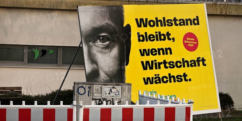 Large FDP election poster with Christian Lindner for the 2025 Bundestag election behind a barrier, Witten, Ruhr area, Germany, Europe