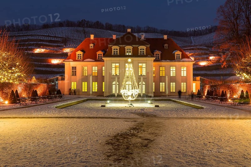 Wackerbarth's winter magic, castle and vineyards with Christmas lights and snow, Radebeul, Saxony, Germany, Europe