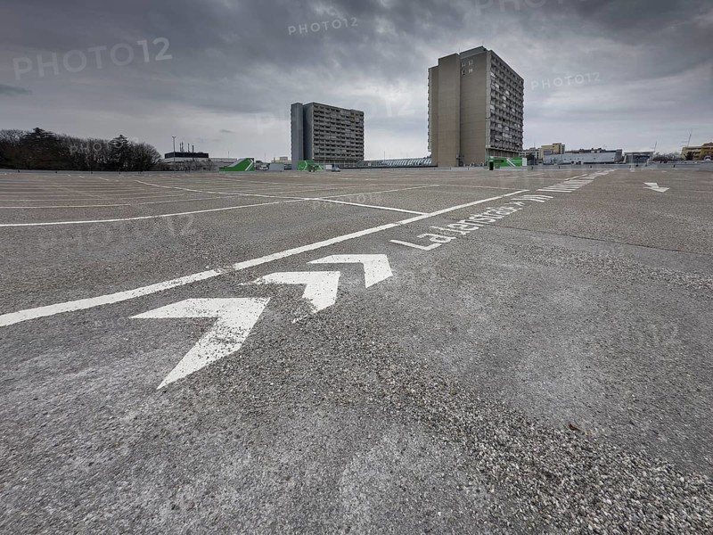 Symbolic image economic crisis, dark clouds in the sky, empty parking deck at Olympia-Einkaufszentrum OEZ, Pelkovenstraße, Munich, Bavaria, Germany, Europe