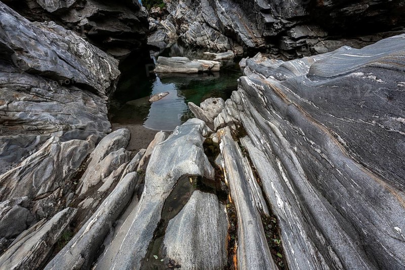Rocks, granite rock formations in the Maggia River near Ponte Brolla, in the Maggia Valley, Valle Maggia, Canton Ticino, Switzerland, Europe