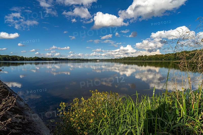 Clouds reflected in the Danube reservoir Faimingen, Lauingen Donau, Bavaria, Germany, Europe