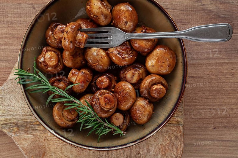 Fried mushrooms, with spices, in soy sauce, vegetarian food, homemade, no people