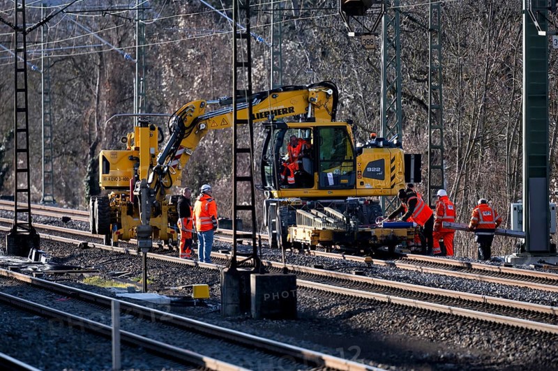 Labourers working with Liebherr A922 Rail Litronic and Kuhnle RR14 EVO 3 Rail two-way working platform on rails, line closure, construction site implementation Digital node between Waiblingen and Bad Cannstatt, Stuttgart, Baden-Württemberg, Germany, Europe