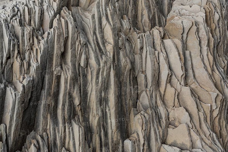 Reynisfjara Beach with Basalt rocks (Stuolabrrg) and the rock needles (Haidrangur), close to Vik i Myrdal, South Iceland