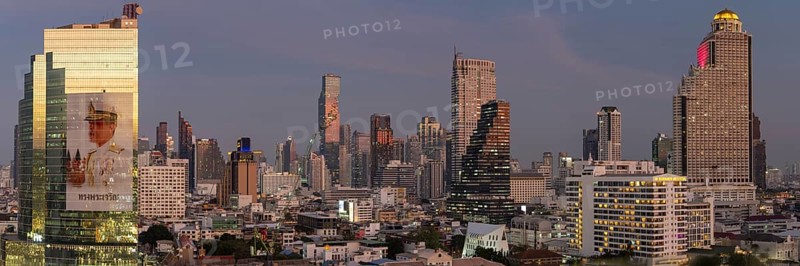 Panorama from the viewing platform of the Iconsiam on CAT Tower with huge billboard of the Thai King Maha Vajiralongkorn, skyscrapers, hotels and the banking district Bang Rak, skyline of Bangkok, Thailand, Asia