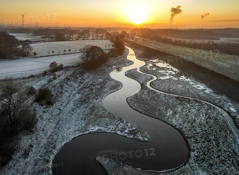 Recklinghausen, Castrop-Rauxel, North Rhine-Westphalia, Germany, winter landscape, EMSCHERLAND construction project, a 37-hectare water and nature discovery park at the water crossroads of the Rhine-Herne Canal and the renaturalised Emscher on the city limits of Recklinghausen and Castrop-Rauxel. The ecological focal point at the confluence of the Suderwicher Bach (right) and Emscher (left) will also be a future garden for the International Garden Exhibition 2027. Before the renaturalisation, the Emscher river system was an open, above-ground wastewater channel, combined sewer with surface water and wastewater, Europe