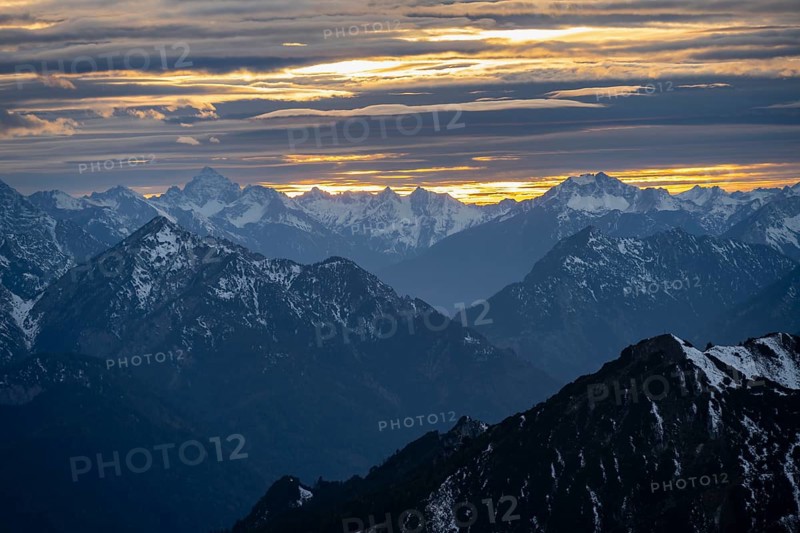 Mountain panorama with snow at sunset, in autumn, view from Kramerspitz, Bavarian Prealps, Bavaria, Germany, Europe
