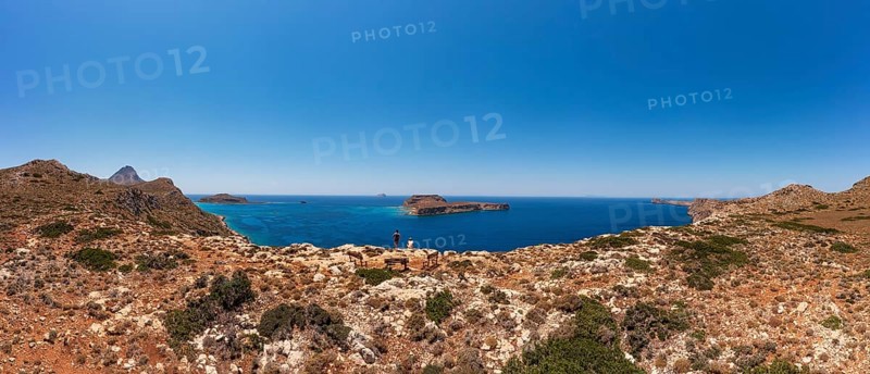 Hikers on the way to the cape of the Gramvousa peninsula with a view of the island of Imeri Gramvousa, Kolimbari, West Crete, Crete, Greece, Europe