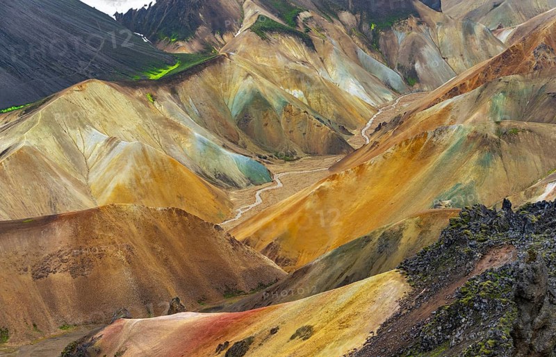 Small river between colourful rhyolite mountains, volcanic landscape, erosion landscape, view from Brennisteinsalda Landmannalaugar, Fjallabak Nature Reserve, Icelandic Highlands, Suðurland, Iceland, Europe