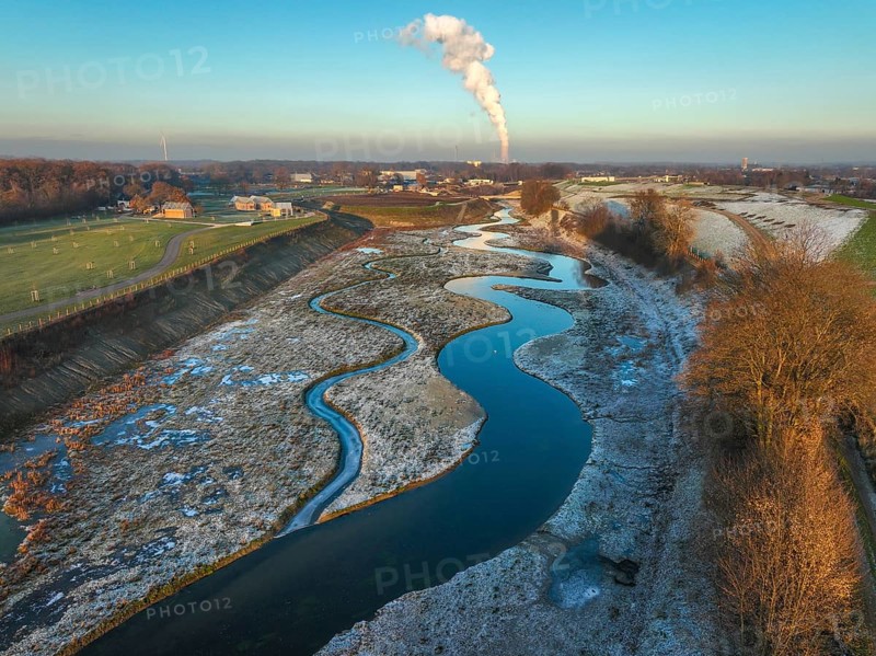 Recklinghausen, Castrop-Rauxel, North Rhine-Westphalia, Germany, winter landscape, EMSCHERLAND construction project, a 37-hectare water and nature discovery park at the water crossroads of the Rhine-Herne Canal and the renaturalised Emscher on the city limits of Recklinghausen and Castrop-Rauxel. The ecological focal point at the confluence of the Suderwicher Bach (left) and Emscher (right) will also be a future garden for the International Garden Exhibition 2027. Before the renaturalisation, the Emscher river system was an open, above-ground wastewater channel, combined sewer with surface water and wastewater. The Uniper power plant Datteln 4 in the background, Europe
