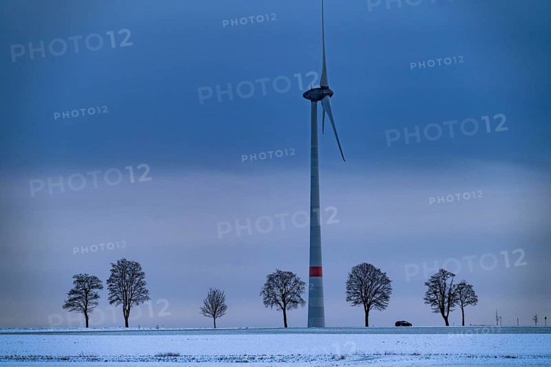 Wind farm, north of Lichtenau, self-proclaimed energy town, over 190 wind turbines and over 1200 solar panels generate 10 times as much electricity as the community of 11, 900 inhabitants consumes, largest onshore cluster of wind turbines in Germany, winter, slightly snow-covered landscape, North Rhine-Westphalia, Germany, Europe
