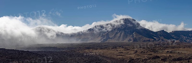 The summit of Montaña Guajara, also: Alto de Guajara, 2715m, crater walls, Caldera de las Cañadas, a huge volcanic cauldron, Teide National Park, Parque Nacional del Teide, at sunrise, Tenerife, Canary Islands, Spain, Europe