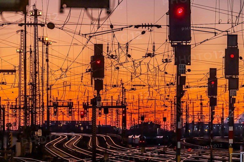 Track apron in the evening with sunset. Frankfurt am Main main station with rails, line mast and signalling systems. Symbolic photo for the infrastructure of Deutsche Bahn AG. Frankfurt am Main, Hesse, Germany, Europe