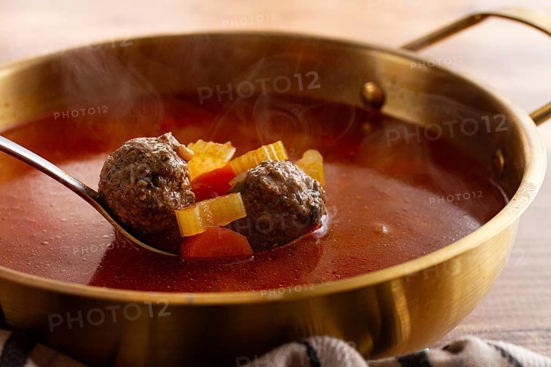 Romanian soup with meatballs, vegetable soup with meatballs, in a pot, homemade, no people