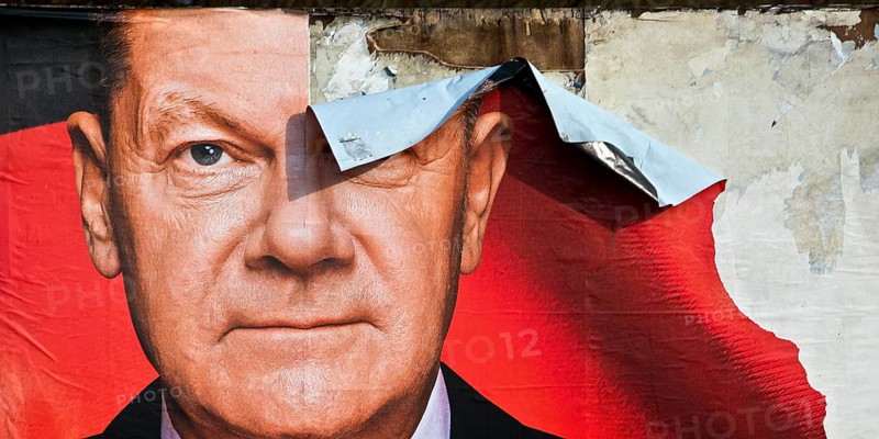Partially destroyed large poster for the 2025 federal election by the SPD with Olaf Scholz, Witten, North Rhine-Westphalia, Germany, Europe