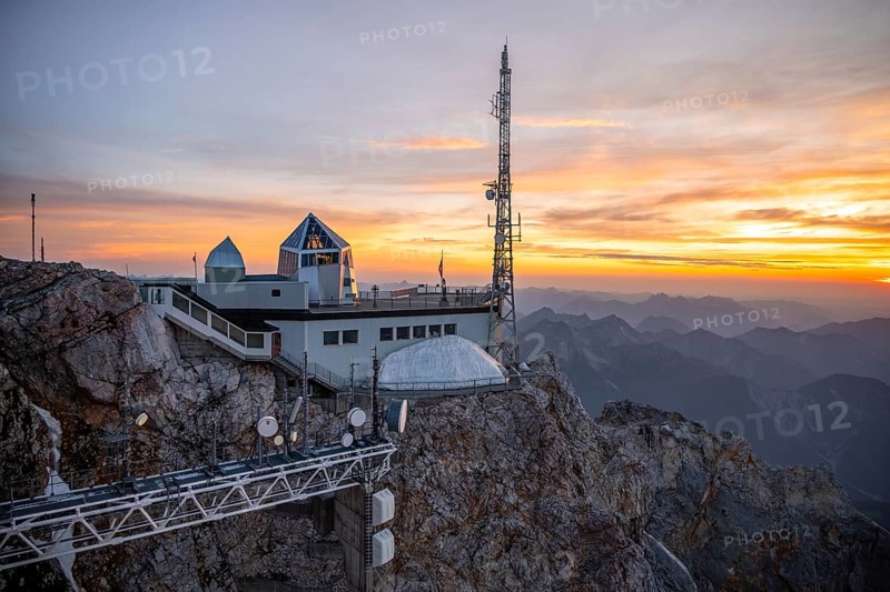 Mountain station of the Tyrolean Zugspitze railway at the summit of the Zugspitze, at sunset, Wetterstein Mountains, Northern Limestone Alps, Bavaria, Germany, Europe