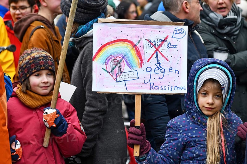 Heidelberg, Germany - February 12th 2025: Children with signs at protest against far-right
