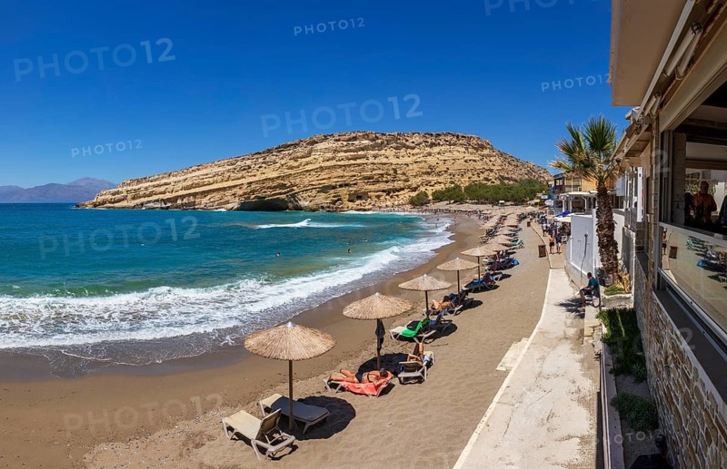Matala beach with a view of the rock caves, south coast, Crete, Greece, Europe