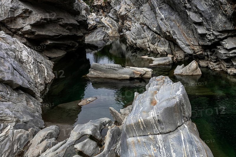 Rocks, granite rock formations in the Maggia River near Ponte Brolla, in the Maggia Valley, Valle Maggia, Canton Ticino, Switzerland, Europe