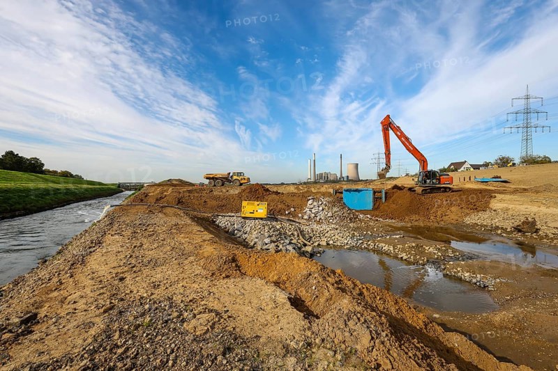 Dinslaken, Voerde, North Rhine-Westphalia, Germany, Emscher estuary into the Rhine. Construction site of the new Emscher estuary in front of the decommissioned STEAG coal-fired power station in Voerde. The old Emscher on the left. The mouth of the Emscher into the Rhine will be moved almost 500 metres north from Dinslaken to Voerde. Fish will then be able to swim barrier-free up the new Emscher from the Rhine through a newly created floodplain area. Following the construction of a parallel sewer, the Emscher has been completely free of sewage since January 2022. The river was previously an open, above-ground combined sewer with rainwater and wastewater. The new Emscher main course on the right. Flood protection thanks to wide outlet areas in the new river delta, Europe