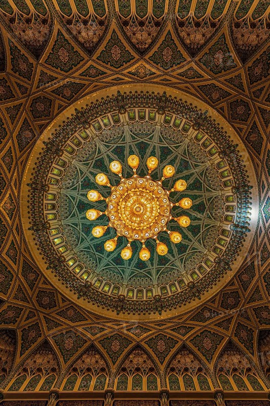 Dome and illuminated chandelier in the Sultan Qaboos Mosque, Muscat, Arabian Peninsula, Sultanate of Oman