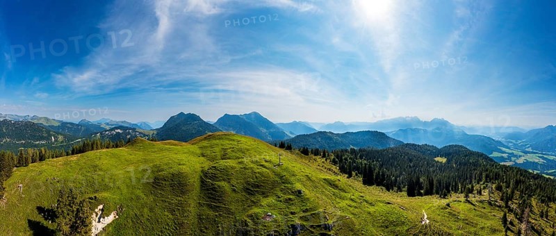 Drone shot, at the summit of the Taborberg with a view of the Osterhorn group and Dachstein massif, Salzkammergut, Salzburg province, Austria, Europe