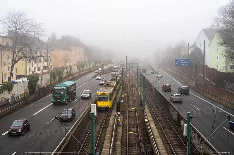 Dense fog, with visibility sometimes less than 100 metres, A40 motorway, city passage in Essen, underground line U18 in the middle lane, North Rhine-Westphalia, Germany, Europe