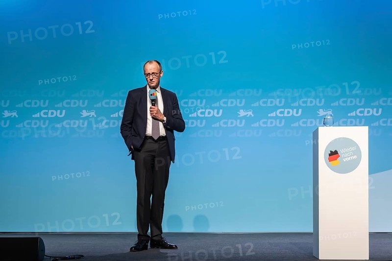 New Year's reception of the CDU with chancellor candidate Friedrich Merz in Künzelsau. The Federal Chairman of the CDU and Chairman of the CDU-CSU parliamentary group spoke to an audience of 2000 at the Carmen Würth Forum. Portrait during his speech on stage. Künzelsau, Baden-Württemberg, Germany, Europe