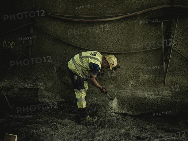 Workers in cross-passage 70, construction lot H53 in the Brenner Base Tunnel, Tyrol, Austria, Europe