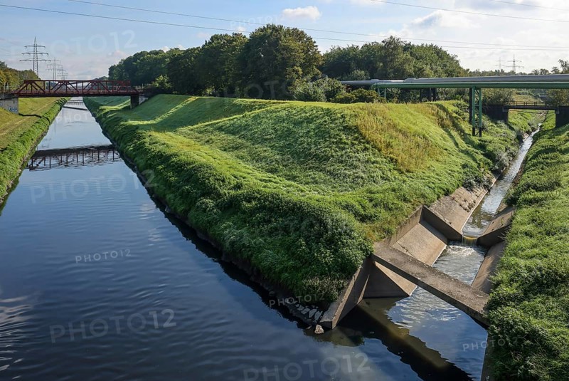 Essen, North Rhine-Westphalia, Germany - The Emscher has been completely free of wastewater since January 2022 following the construction of a parallel sewer. The river, shown here at the mouth of the Schwarzbach, was previously an open, above-ground wastewater sewer, mixed sewer with surface water and wastewater