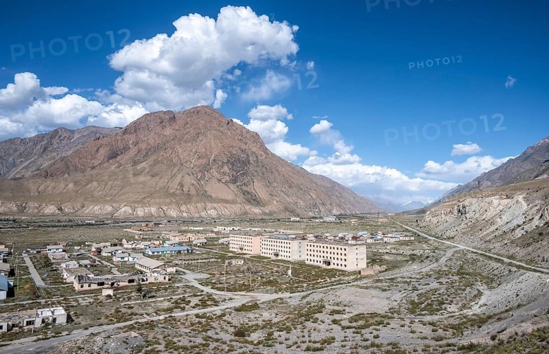 Abandoned ruined buildings in a mountain landscape, ghost town, Engilchek, Tian Shan, Kyrgyzstan, Asia