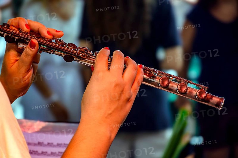 Woman's hands playing transverse flute during musical performance Belo Horizonte, Minas Gerais, Brazil, South America
