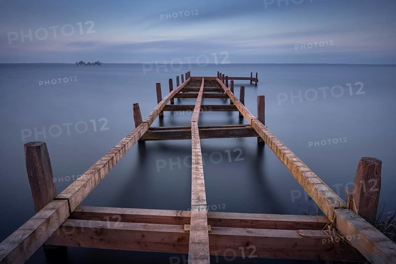 View of a partially dismantled jetty on the Steinhuder Meer, long exposure, Wilhelmstein, Hagenburg Canal, lake, nature photo, landscape photography, drifting clouds, landscape format, wood, Hagenburg, Hanover region, Lower Saxony, Germany, Europe