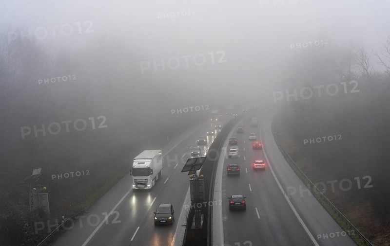 Dense fog, with visibility sometimes less than 100 metres, A52 motorway, in Essen, North Rhine-Westphalia, Germany, Europe