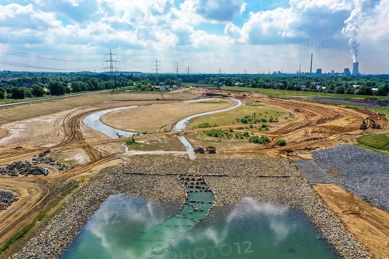 Dinslaken, Voerde, North Rhine-Westphalia, Germany, Emscher estuary into the Rhine. Construction site of the new Emscher estuary. The mouth of the Emscher into the Rhine is being moved almost 500 metres north from Dinslaken to Voerde. Fish will then be able to swim barrier-free up the new Emscher from the Rhine through a newly created floodplain area. Following the construction of a parallel sewer, the Emscher has been completely free of sewage since January 2022. The river was previously an open, above-ground combined sewer with rainwater and wastewater, Europe
