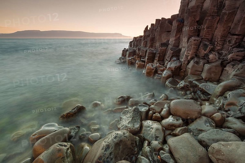 Basalt columns, columnar basalt, coast, long exposure, Hofsos or Hofsós, Skagafjörður, Norðurland, Iceland, Europe