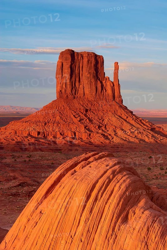 Monument Valley with majestic red sandstone formations in the desert under a clear sky in sunlight, Monument Valley Navajo Tribal Park, Utah-Arizona, USA, North America