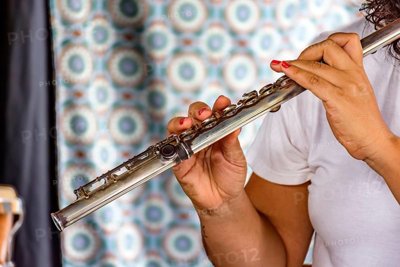 Musical performance with transverse flute being played by a woman in Brazil Belo Horizonte, Minas Gerais, Brazil, South America