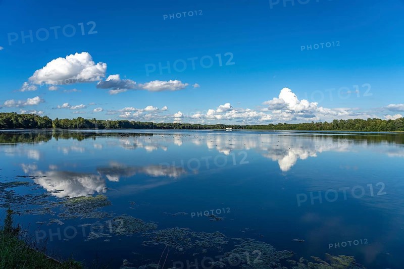 Clouds reflected in the Danube reservoir Faimingen, Lauingen Donau, Bavaria, Germany, Europe