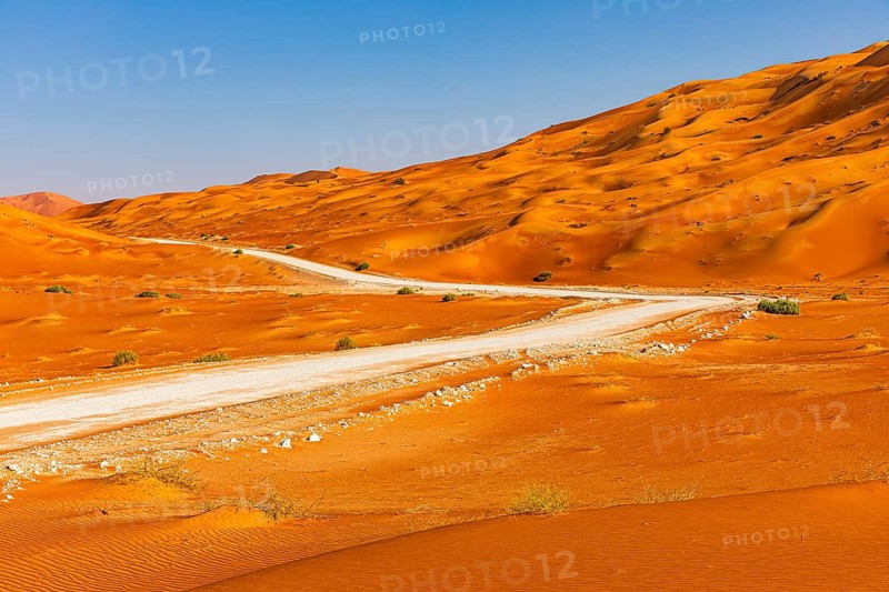 Wide road leads through the Rub al Khali desert, Dhofar province, Arabian Peninsula, Sultanate of Oman