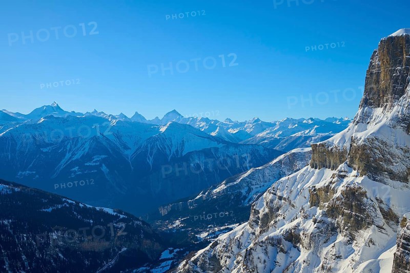 Snowy mountain landscape with clear blue sky and rocky peaks in alpine surroundings, Gemmi Pass, Daubenhorn, Leukerbad, Leuk, Valais, Switzerland, Europe