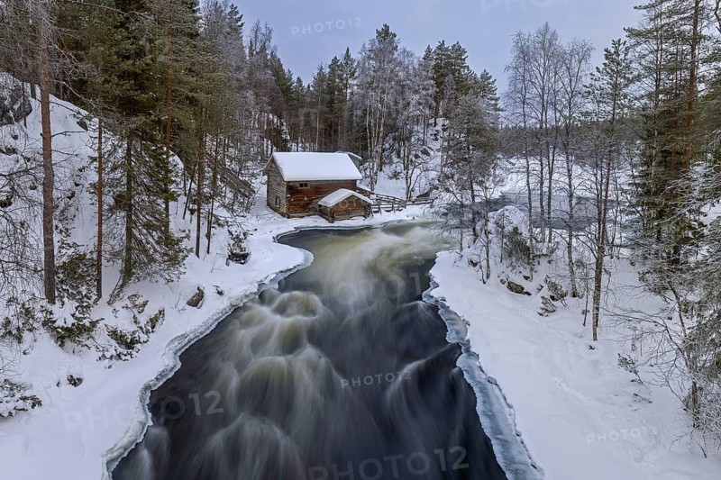 Old wooden Myllykoski water mill along the river Kitkajoki in winter, Oulanka National Park, Northern Ostrobothnia, Norra Österbotten, Finland, Europe