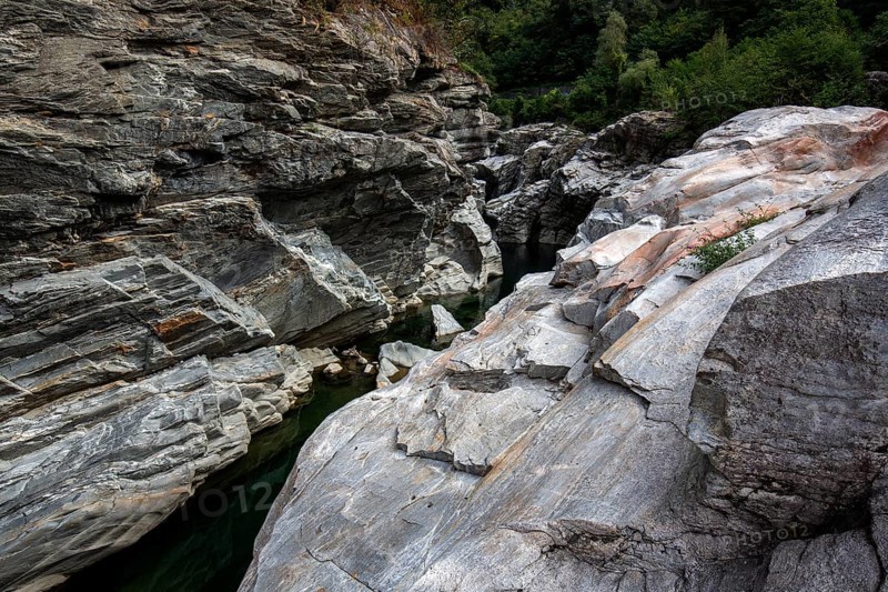 Rocks, granite rock formations in the Maggia River near Ponte Brolla, in the Maggia Valley, Valle Maggia, Canton Ticino, Switzerland, Europe
