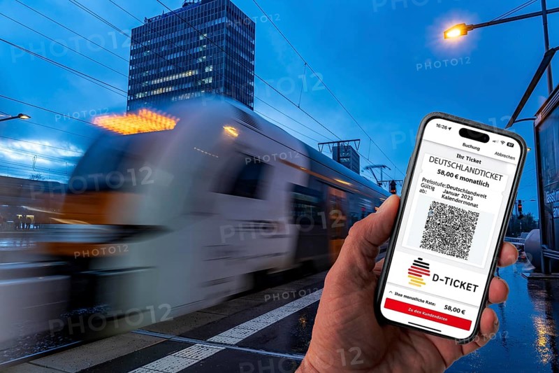 Symbolic image of Deutschlandticket, new from 2025 for 58 euros per month, ticket on mobile phone app, travel on regional transport throughout Germany, for one fare with bus and train