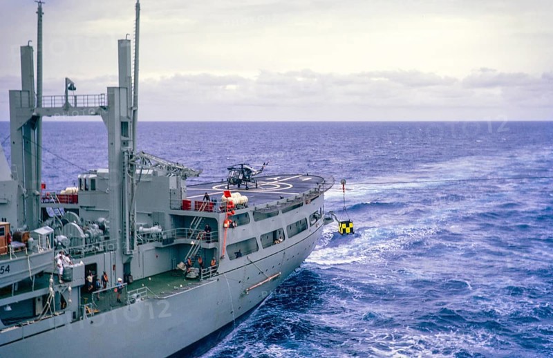 Helicopter on deck, aft end RFA Lyness ship in Atlantic Ocean, Royal Navy, slide dated April 1972