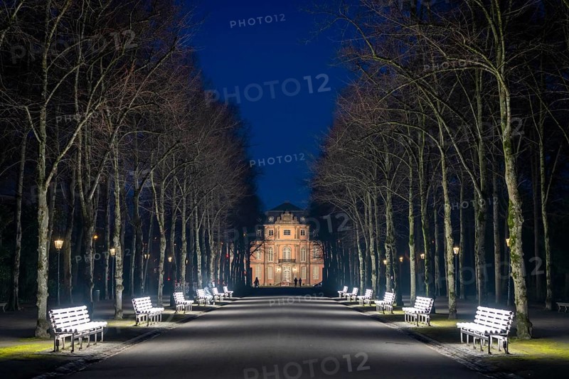 The light benches by artist Stefan Sous in the Hofgarten, entitled UV-A UV-B, 14 completely refurbished exhibits from the 2002 light-grey art exhibition, which now stand and light up as a permanent work of art on Jägerhofallee, LED technology, in the background Jägerhof Palace, home of the Goethe Museum, Düsseldorf, North Rhine-Westphalia, Germany, Europe