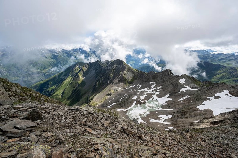 Cloudy mountain landscape at the summit of Lasörling, view to Berger Kees and mountain peak Schober, Lasörling Group, Hohe Tauern National Park, East Tyrol, Tyrol, Austria, Europe