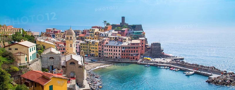 Cinque Terre, Italy, Scenic view of Vernazza shoreline and colorful buildings in a bay, Europe